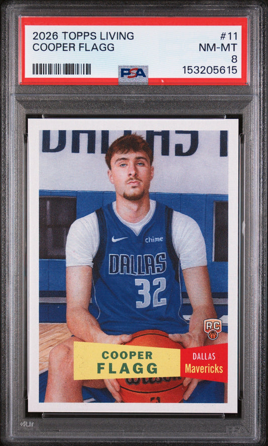 PSA-graded rookie basketball card featuring Cooper Flagg in Dallas Mavericks blue jersey, card number 11, encased in protective plastic holder with red label.
