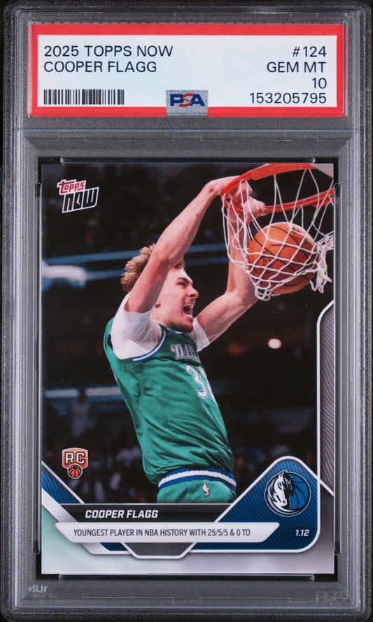 Graded PSA 10 sports trading card in clear plastic case showing Cooper Flagg in green Mavericks jersey dunking basketball with red label at top.