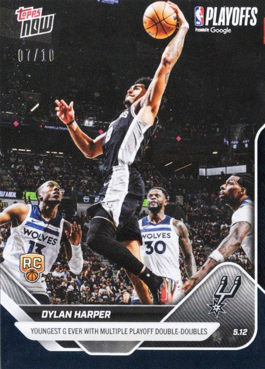 Black Topps Now basketball card featuring Dylan Harper in white Spurs uniform jumping with ball, surrounded by Timberwolves players, with card number and achievement text at bottom.
