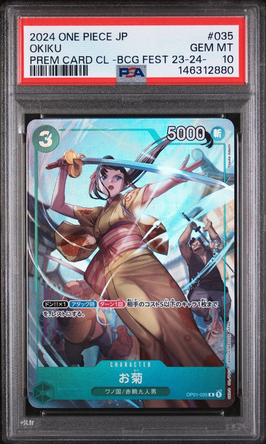 PSA 10 graded 2024 One Piece Okiku card in clear slab displaying anime character in yellow and red outfit with sword against blue background.