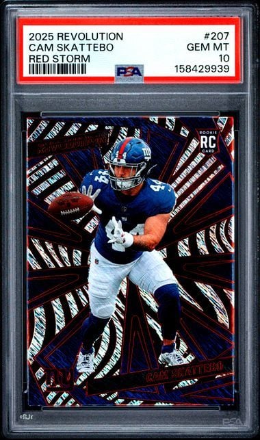 PSA-graded rookie football card in clear plastic case showing player in blue and white uniform catching football against red and black geometric background.