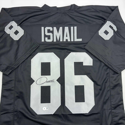 Autographed/Signed Raghib Ismail Rocket Oakland Black Football Jersey Beckett BAS COA
