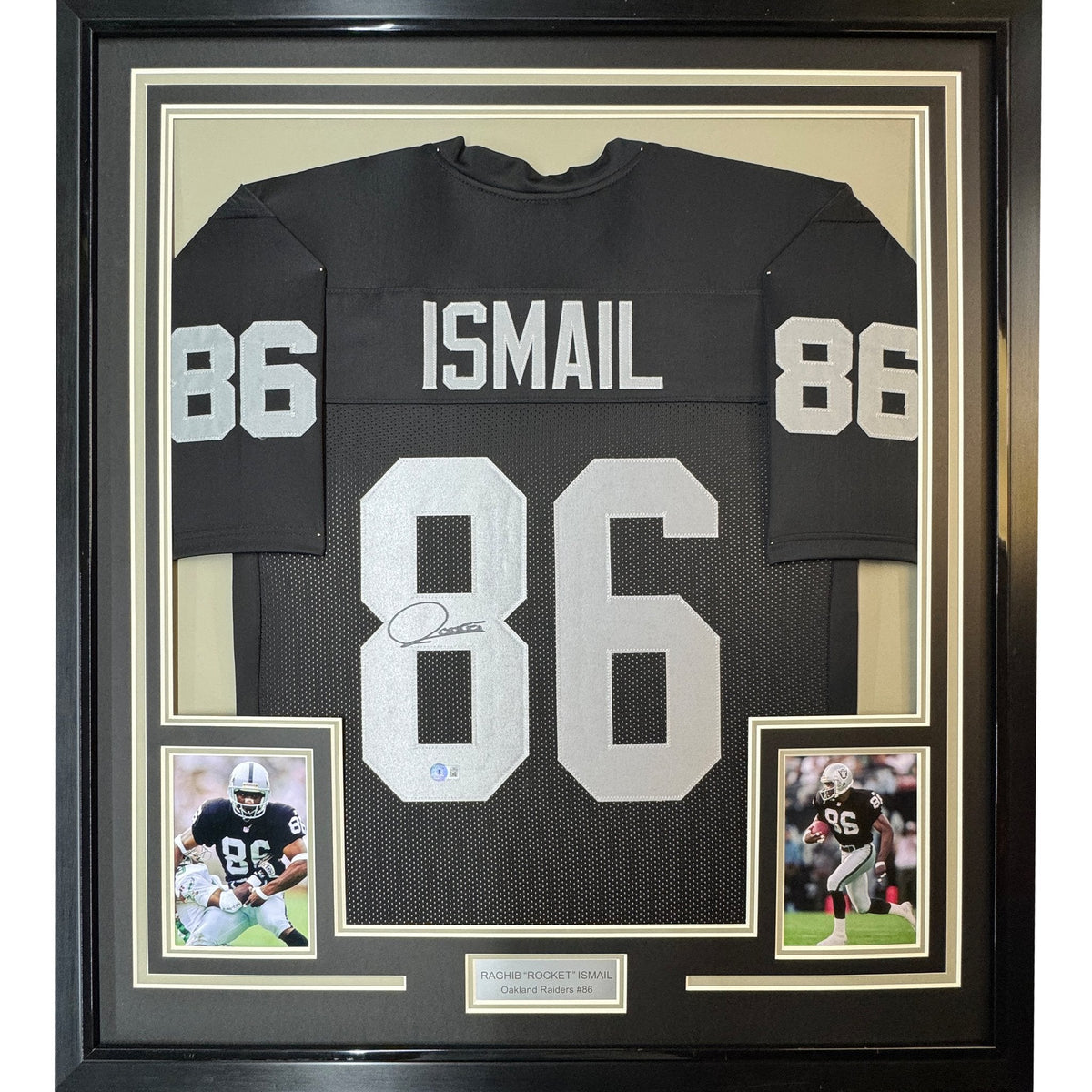 Back view of a framed black jersey showing silver ISMAIL name and number 86, with two small photos below.
