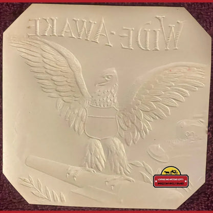 Embossed eagle stamp on a 1910s antique patriotic cigar label celebrating US Navy Fleet