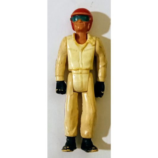 1976 Fisher Price Evil Knievel action figure in yellow suit with red helmet