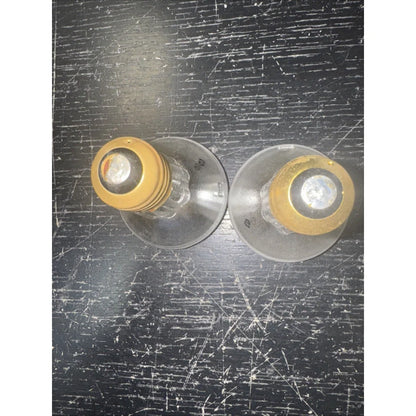 Pair of replacement light bulbs for lamp 50par20 on black surface