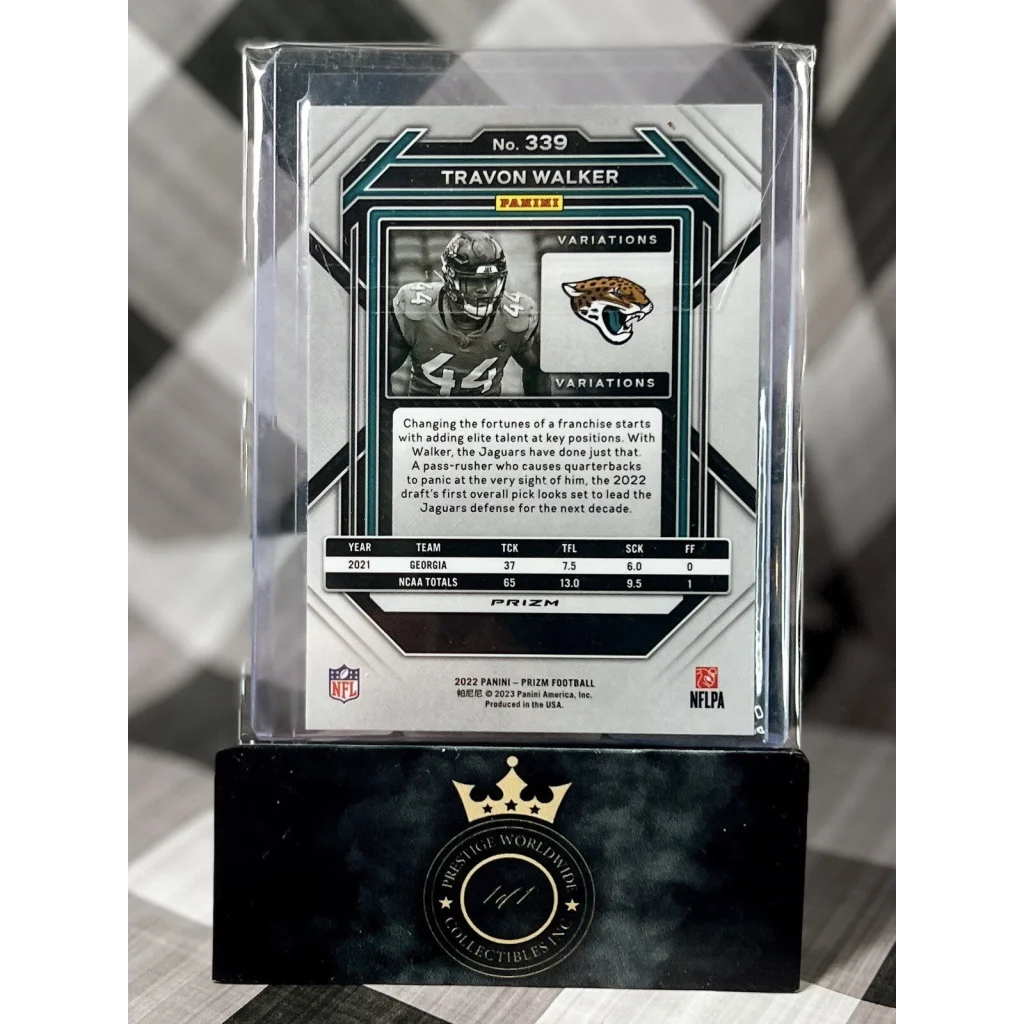 Black and white football card in gold-accented case from Prestige Worldwide