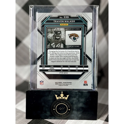 Black and white football card in gold-accented case from Prestige Worldwide