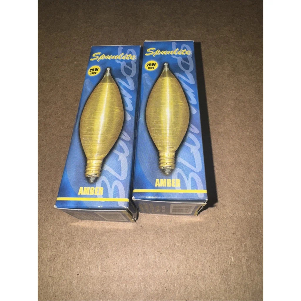 Two Bulbrite Spunlite 25W 130V amber candelabra bulbs in blue packaging