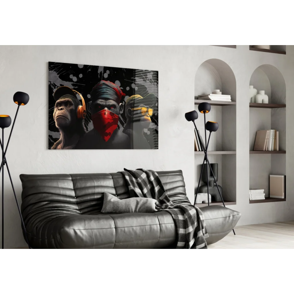 3D printed monkey wall art with headphones and red bandana on black leather sofa