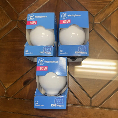 3 vintage Westinghouse 60 watt G25 light bulbs in blue packaging