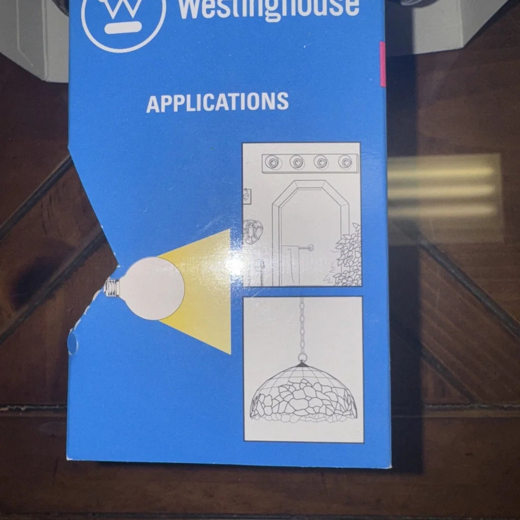 Westinghouse 60 watt G25 light bulb in blue box