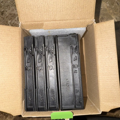 4 pack 952 XL ink cartridges in black plastic cases with embossed markings