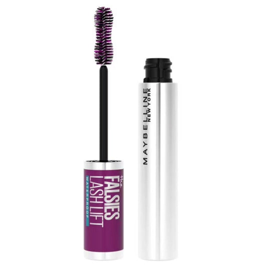 Maybelline The Falsies Lash Lift mascara with purple brush displayed next to white cylindrical tube on white background.