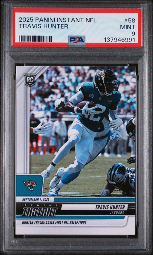 PSA graded card in clear case showing Travis Hunter in Jacksonville Jaguars uniform catching football, with red grading label and barcode visible.