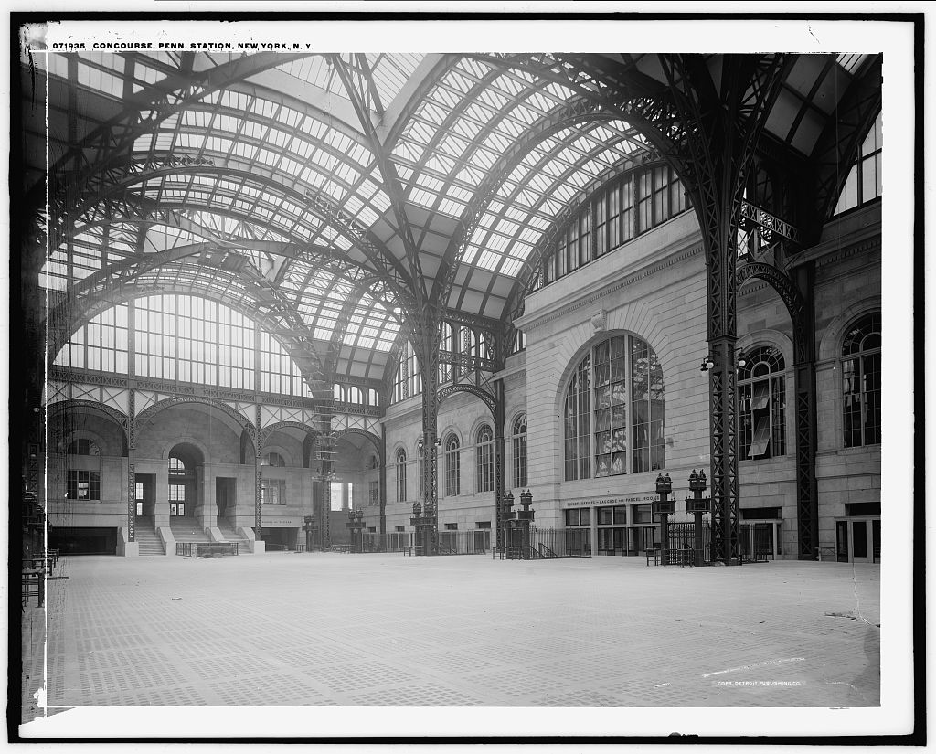 Period photograph of the concourse at Pennsylvania Station, New York - the Pennsylvania Railroad's flagship station, shown for historical context; it is not the certificate offered here.