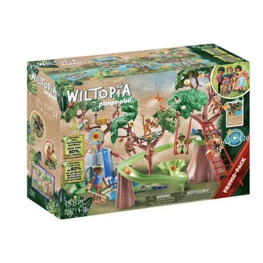 Playmobil Wiltopia jungle playground set box displayed at three-quarter angle, showing colorful illustrated packaging with trees, figures, and play features against white background.