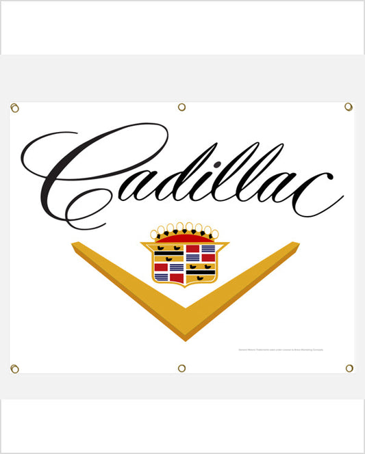 Front view of a white banner with black script reading 'Cadillac' above a gold V chevron and red, blue and gold crest.