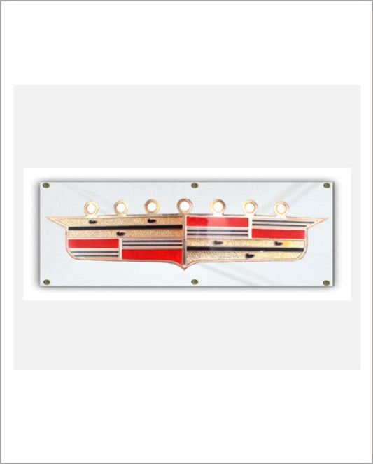 Front view of a grey vinyl banner with a gold Cadillac crest emblem, red and black bars, and seven round lights.