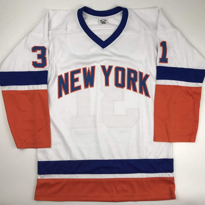 White New York Rangers hockey jersey with navy and red horizontal stripes, displayed flat against white background showing front view with visible numbers and lettering.