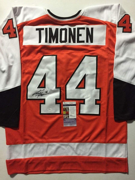 Back view of signed orange and white Philadelphia Flyers hockey jersey number 44 with Timonen nameplate and JSA authentication certificate.