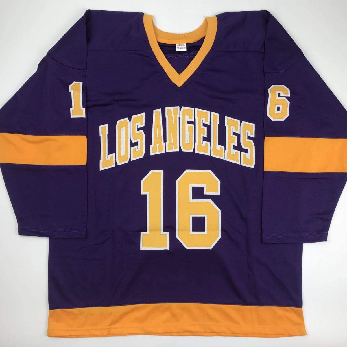 Purple and gold Los Angeles hockey jersey with number 16 displayed flat on white background, showing front view with orange stripe trim.