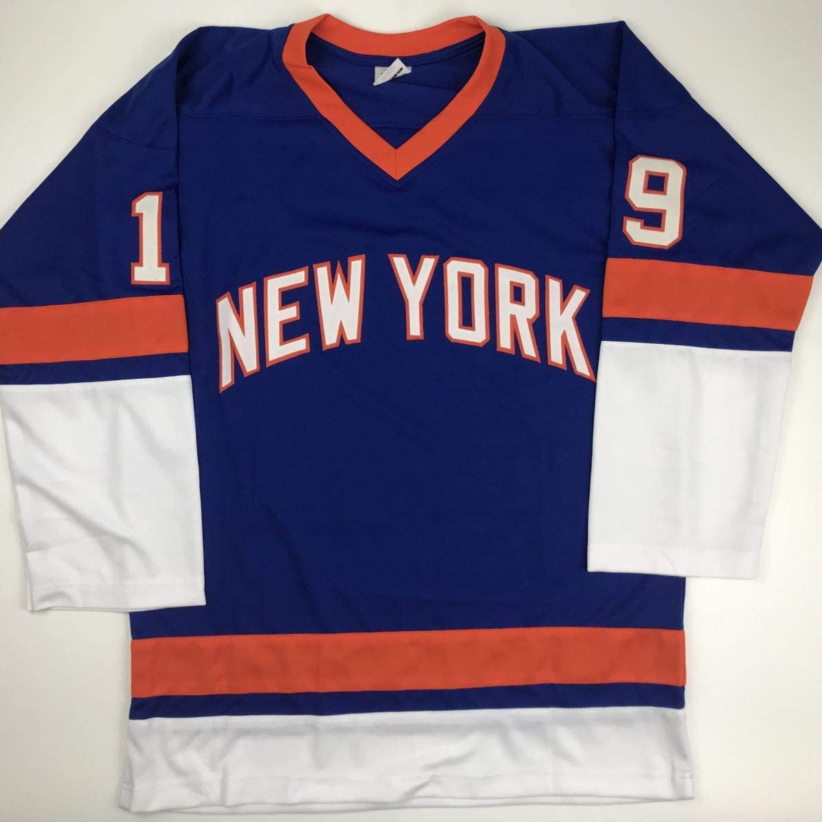 New York Rangers blue hockey jersey with orange and white stripes, displayed flat, showing front with "NEW YORK" text and numbers 1 and 9 on sleeves.