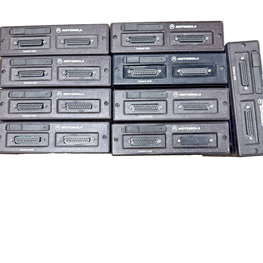 Eight black Motorola control units arranged in four rows of two, each featuring dual D-sub connectors, displayed from above against white background.