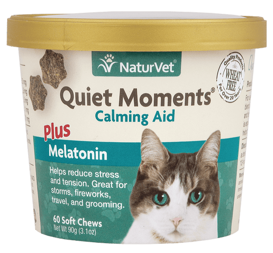 NaturVet Quiet Moments Calming Aid container with gold lid, featuring tabby and white cat face on teal and cream label, front packaging view.