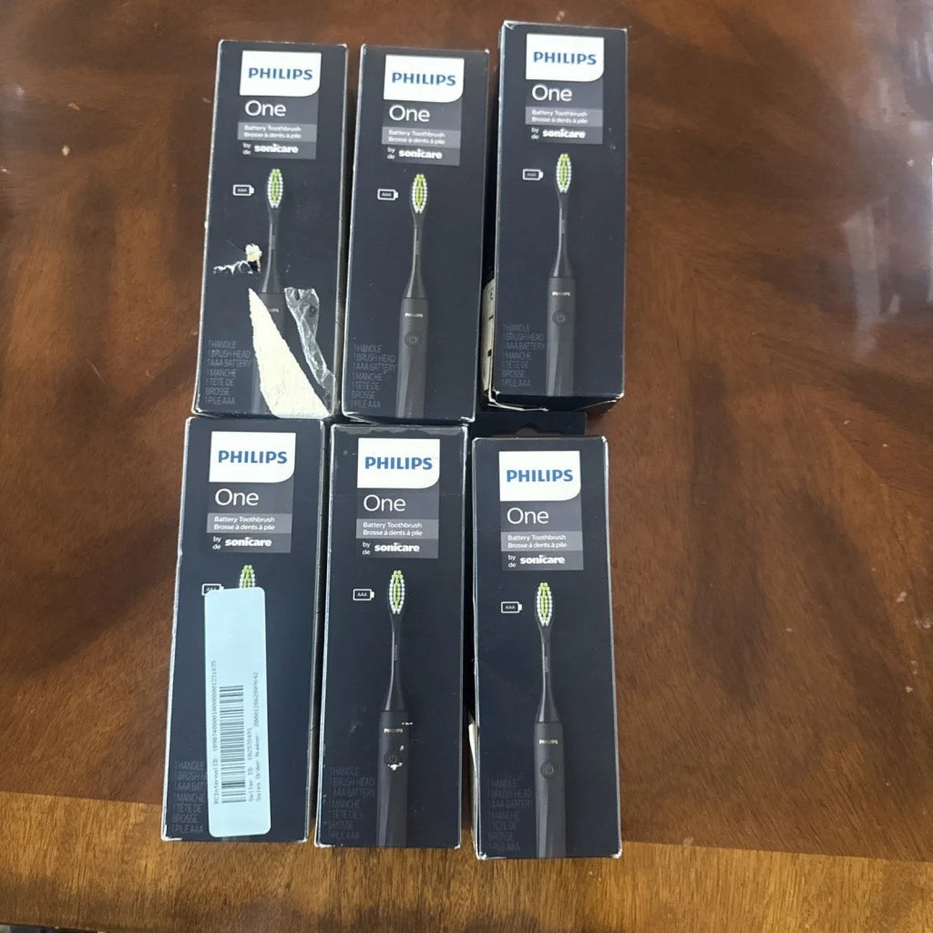 Six Philips One Sonicare HY1100/54 battery toothbrushes in packaging