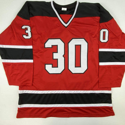Red hockey jersey with black and white horizontal stripes, number 30 centered on chest, numbers 3 and 0 on shoulders, displayed flat against white background.