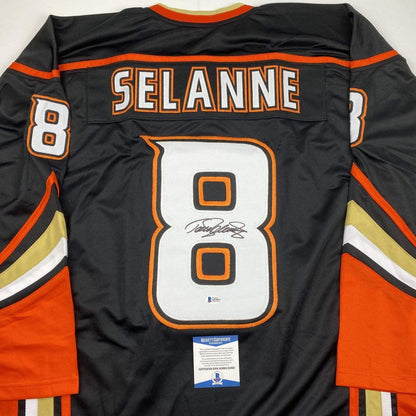Autographed/Signed Teemu Selanne Anaheim Black Hockey Jersey Beckett BAS COA