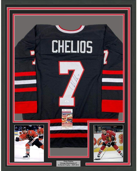 Front view of framed black Chicago Blackhawks jersey number 7 signed by Chris Chelios, displayed with two action photos and authentication certificate.