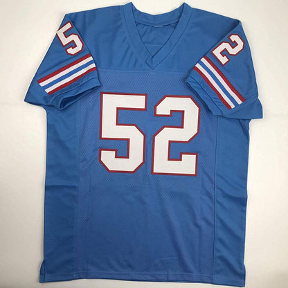 Autographed/Signed Robert Brazile Hall of Fame Houston Blue Football Jersey JSA COA