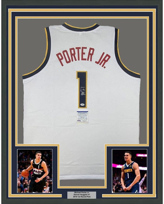 Framed white Denver Nuggets basketball jersey #1 signed by Michael Porter Jr., displayed with two action photos and authentication certificate.