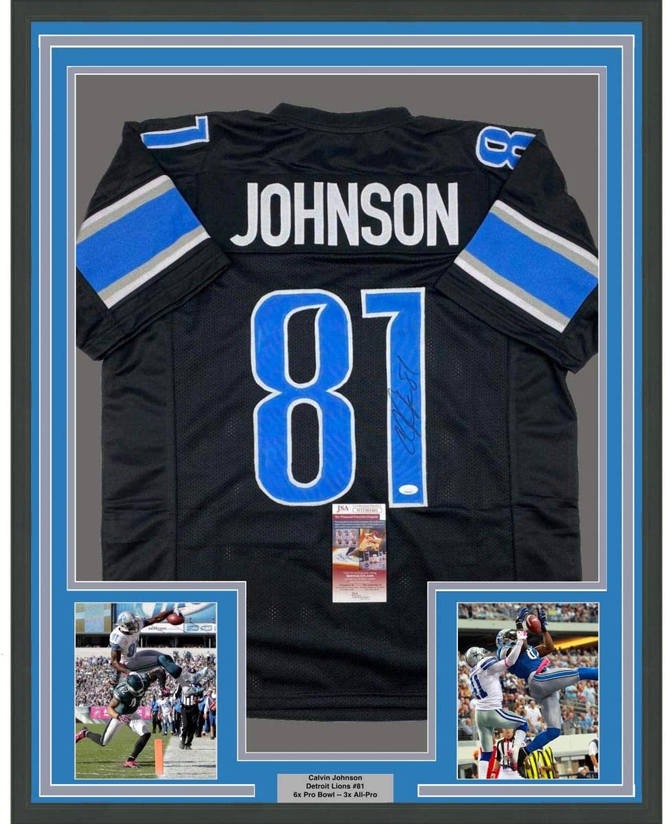 Calvin Johnson Megatron signed Detroit Lions black football jersey back view in 35x39 framed display