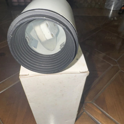 White track light head fixture back view with black gasket and internals
