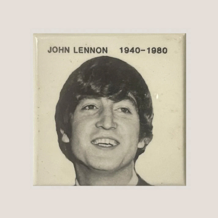 Black and white portrait pin with "JOHN LENNON 1940–1980" text on cream background.