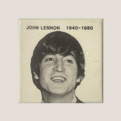 Black and white portrait pin with "JOHN LENNON 1940–1980" text on cream background.