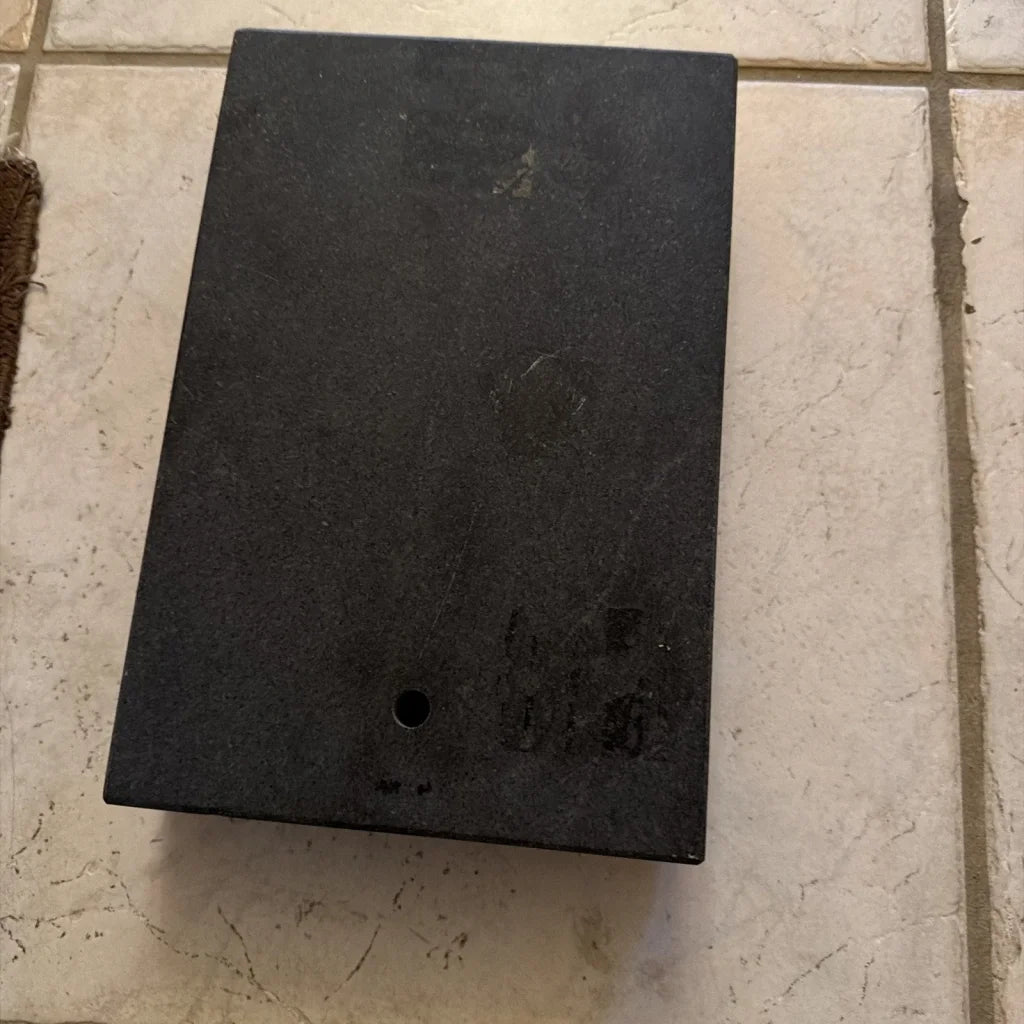 Back of 8x12x2 inch granite surface plate with drain hole
