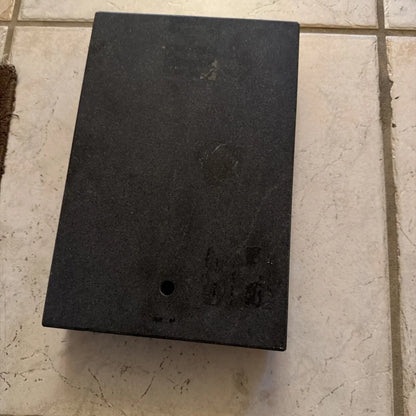 Back of 8x12x2 inch granite surface plate with drain hole