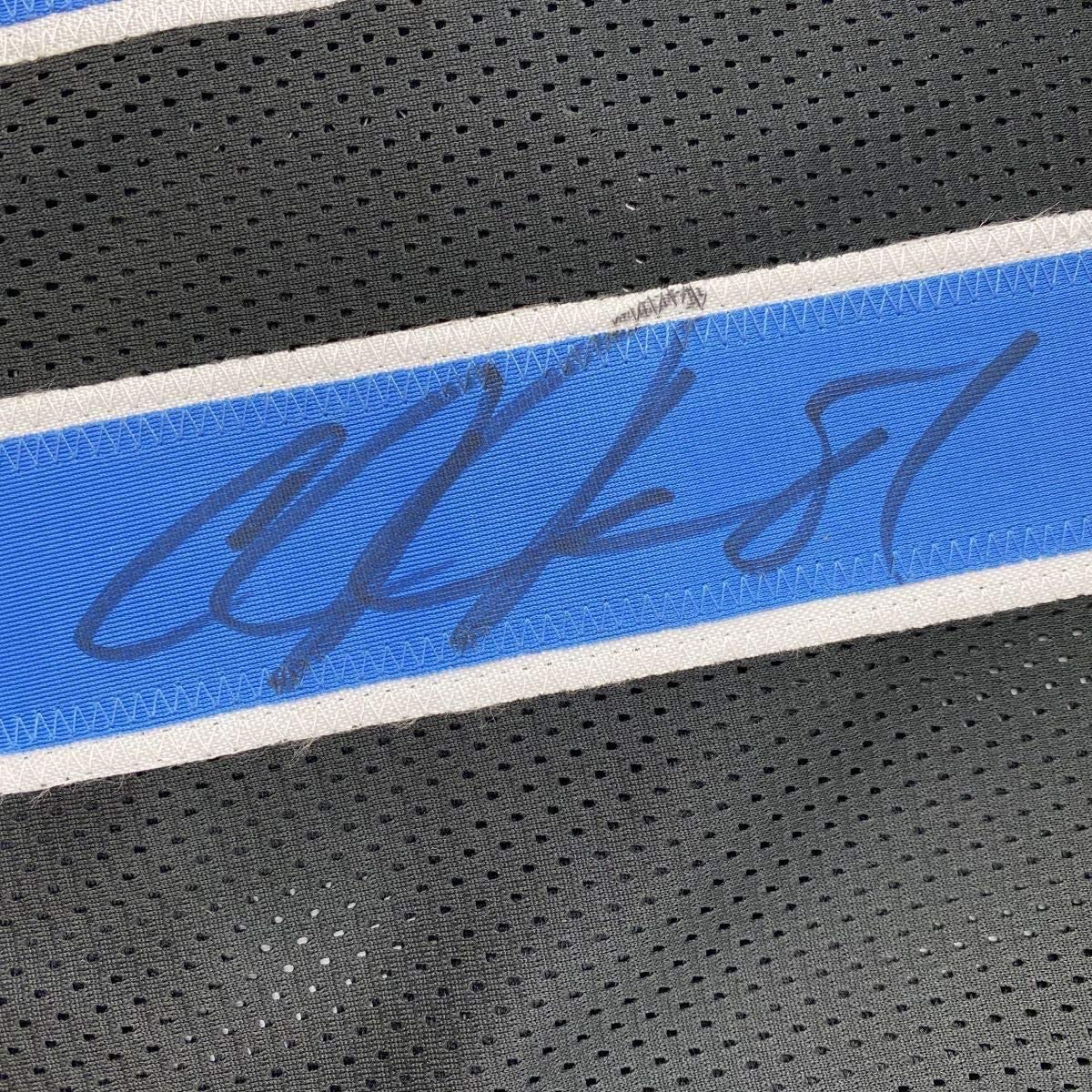 Calvin Johnson Megatron autographed Detroit Lions black football jersey framed 35x39 display with JSA COA