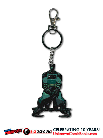 Front view of a metal keychain with a teal and black Batman figure in a cape, clasp at top.