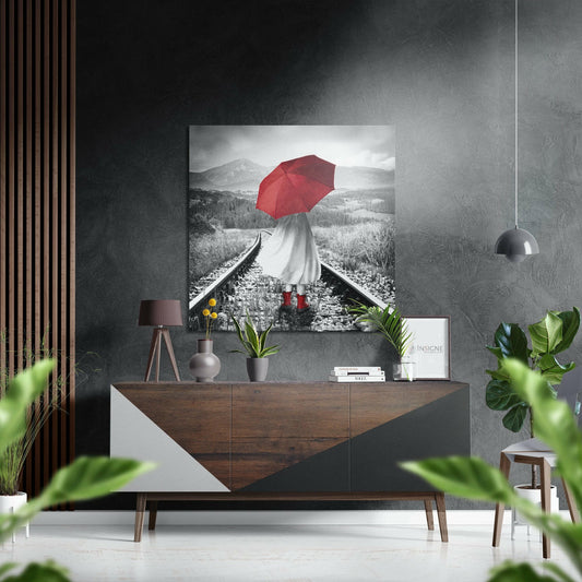 Red Umbrella Brushed Aluminium Dibond displayed on dark wall above wooden dresser in modern interior setting.