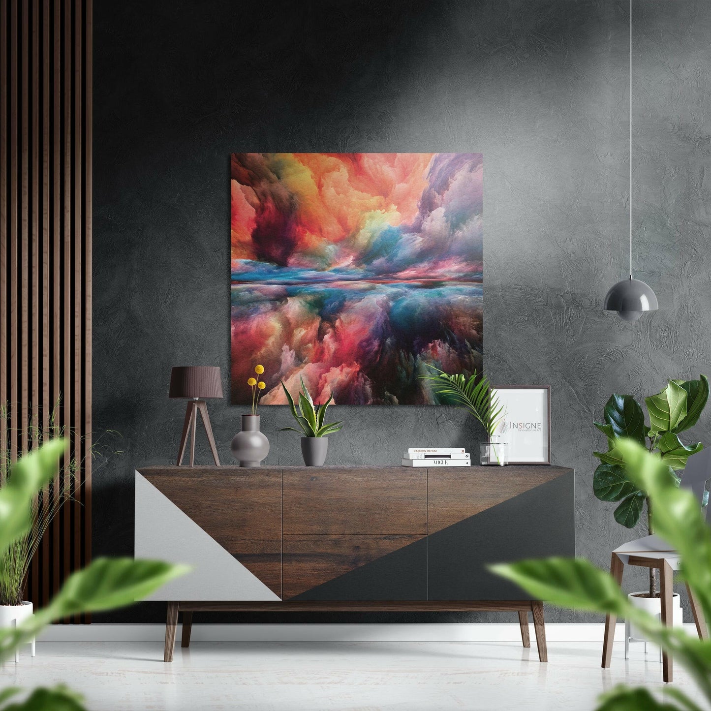 Colorful Clouds Dibond wall art displayed above a wooden dresser in a modern interior with plants and pendant lighting.