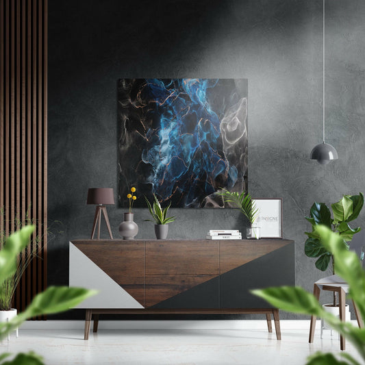 Modern living room interior featuring blue and black marble-textured wall art displayed above a wooden sideboard with decorative accessories.