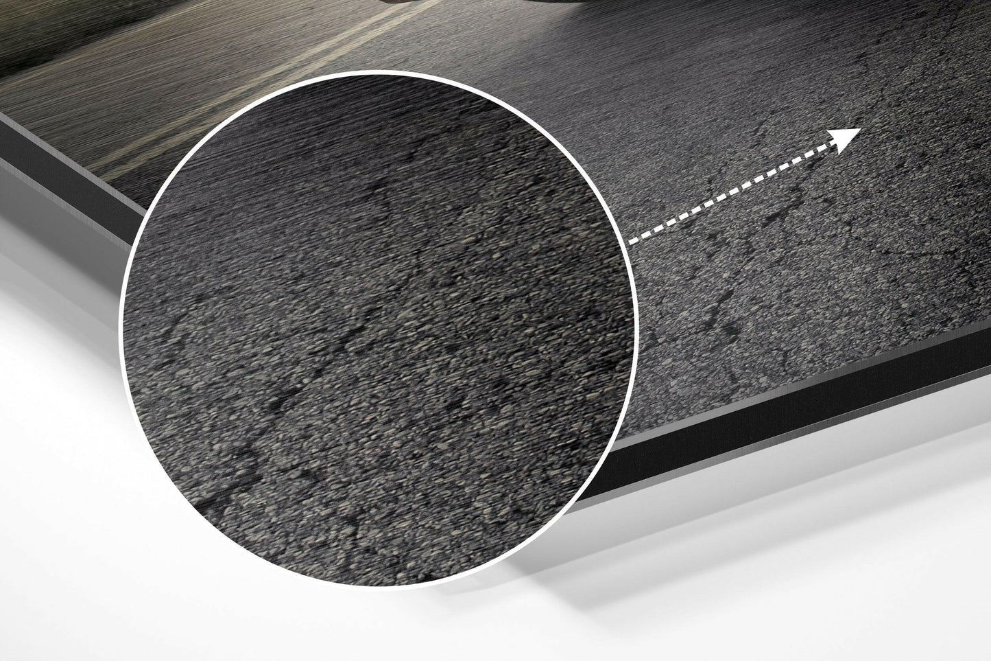 Close-up detail of asphalt road texture with white dashed center line and directional arrow on brushed aluminium Dibond wall art.