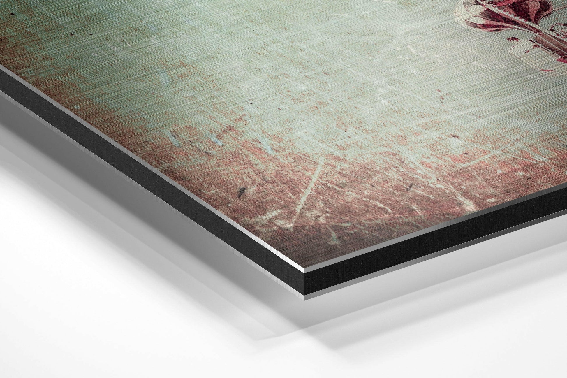 Close-up angled view of Ferris Wheel brushed aluminium Dibond print showing layered edges and textured surface detail.