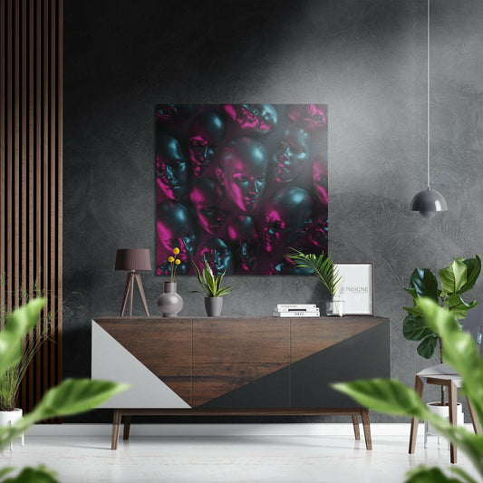 Vibrant magenta and teal sculptural heads artwork displayed above a wooden console table in a modern grey interior.