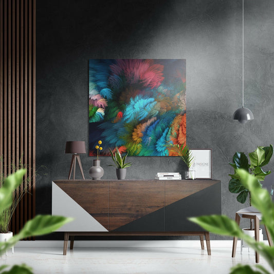 Colorful abstract brushstroke artwork displayed above wooden sideboard in modern interior setting with plants and pendant light.